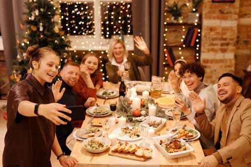 group of people having Christmas dinner