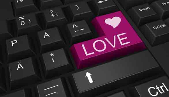 An ENTER key on a keyboard that says LOVE instead